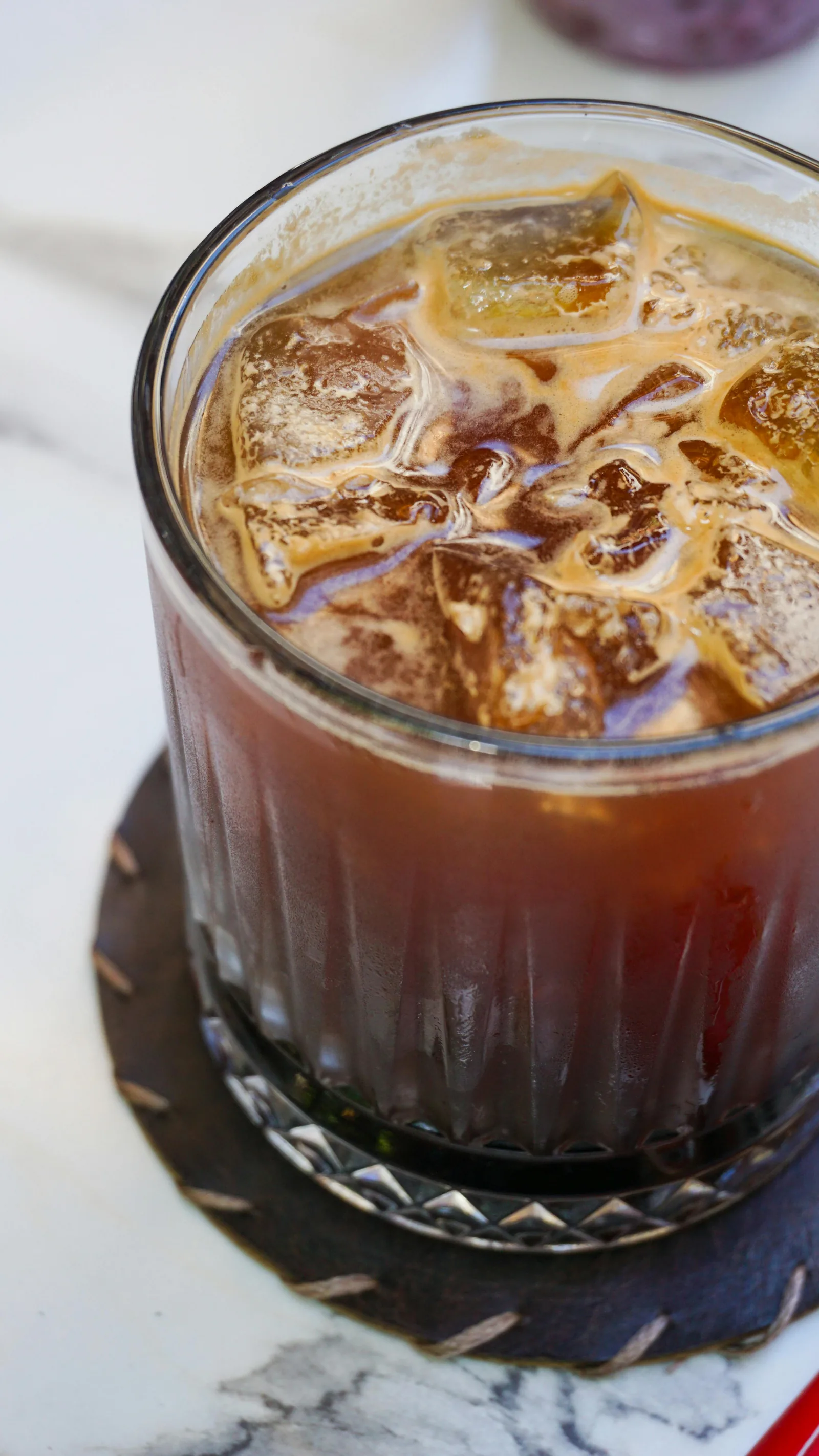 Real iced coffee drink with ice cubes